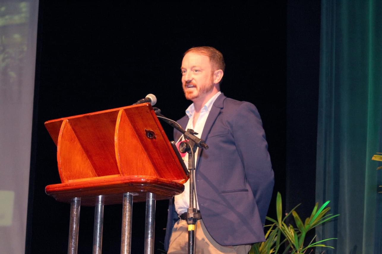 Daniel Atz speaking from a lectern